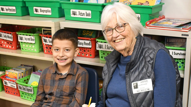 K-8 School in Wyoming: Residents of Waterford Place visit Vanguard every two weeks to help students with reading.