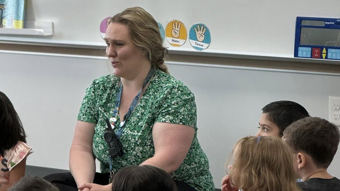 K-8 School in Colorado Springs CO: Kinder Camp teacher at Mountain View Academy talking to students..