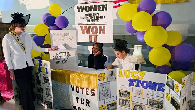 K-8 School in Wake Forest: Wake Forest Charter Academy students show the importance of women winning their right to vote.