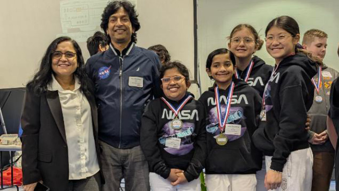 K-8 School in Canton: Canton Charter Robotics team pose after their win at a regional Robofest competition.