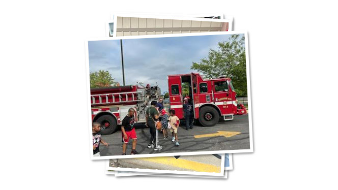 K-8 School in Milwaukee WI: Students got to see a fire truck at the back to school bash event.