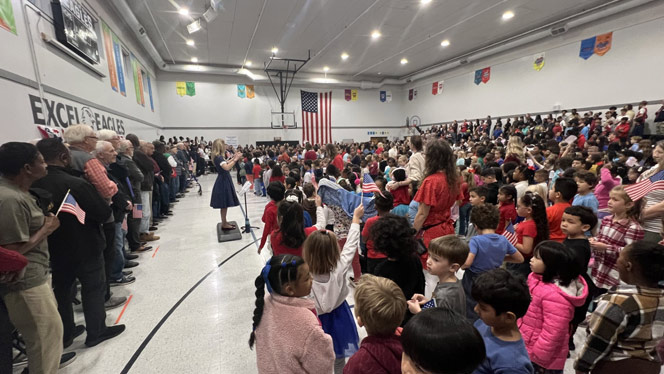 K-8 School in Grand Rapids: Dozens of local veterans attended the event at Excel.