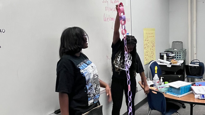 K-8 School in Detroit MI: Detroit Merit students make paper crafts.