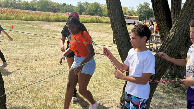 K-8 School in Dayton: Pathway students participating in team building activity at Great Life Farms.