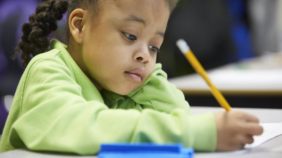 Student Works on a Paper