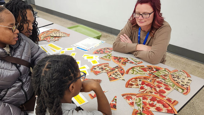 K-12 School in Center Line: Center Line Prep families participate in a game.