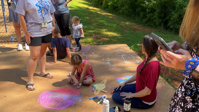 Matthews families created chalk art during the event.
