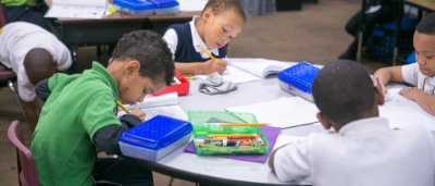 Students completing work in classroom