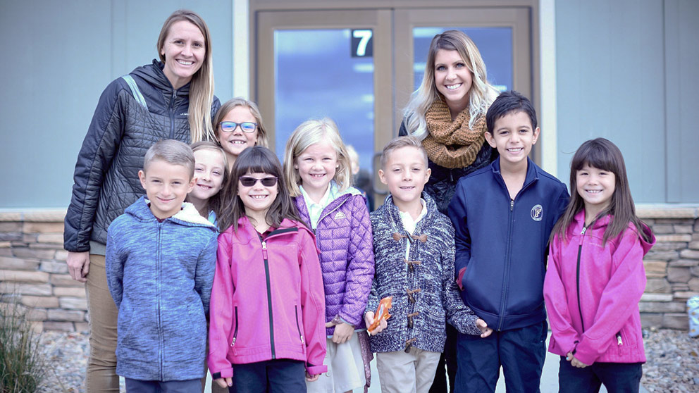 Parent picking up student from class