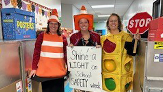 K-8 School in Monroe: Triumph staff dress up during Safe Schools Week.