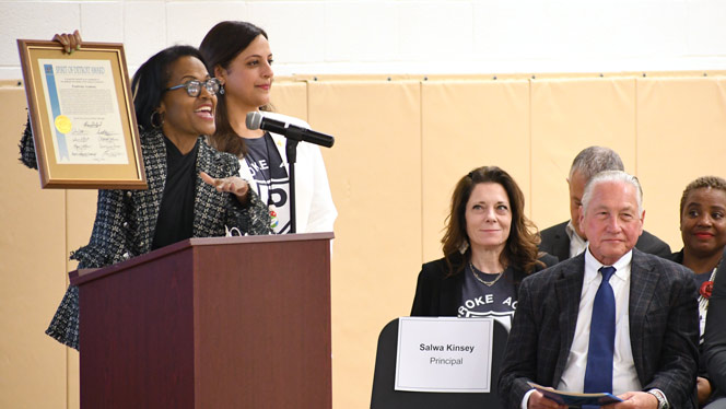 K-8 School in Detroit: Detroit Councilwoman Whitfield-Calloway presents Pembroke with Spirit of Detroit Award.