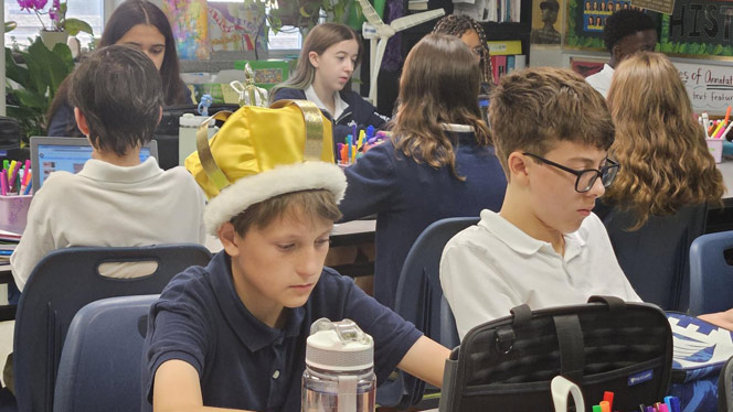 K-8 School in Wake Forest: A Wake Forest student wears a crown while learning about the American Revolution.