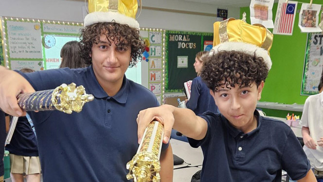 K-8 School in Wake Forest: Wake Forest students pose with crowns and scepters.