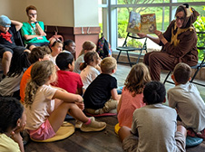 Smiles Highlight Reading Time for NHA Author, IT Manager