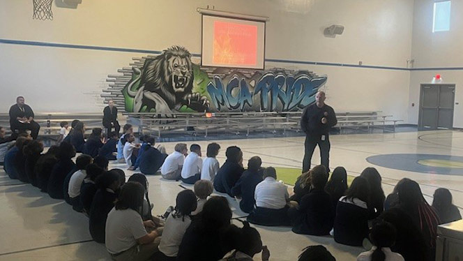 K-8 School in Matthews: Fire Marshall talks to Matthews students during Safe Schools Week.