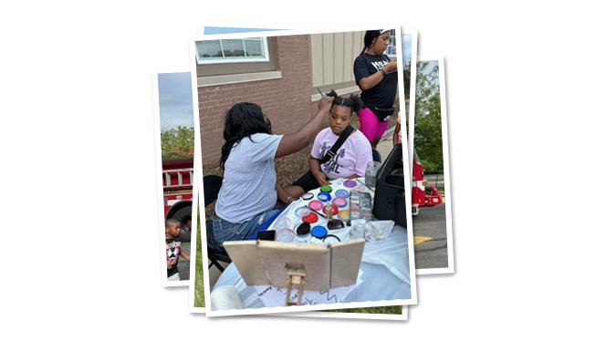 K-8 School in Milwaukee WI: Students were able to get their face painted at the back to school bash event.