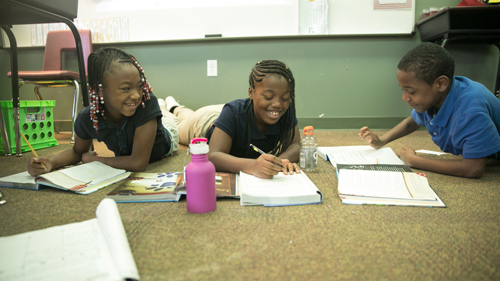 Student Works on a Paper