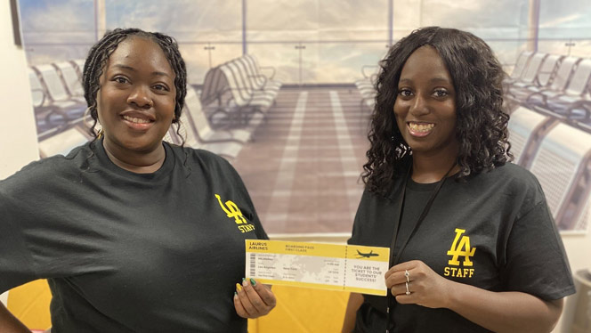 Laurus staff with their airline tickets