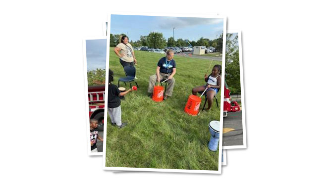 K-8 School in Milwaukee WI: Students got to play the drums at the back to school bash event.