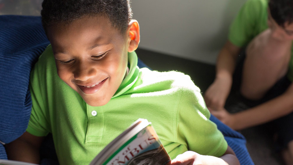 Student reading a book