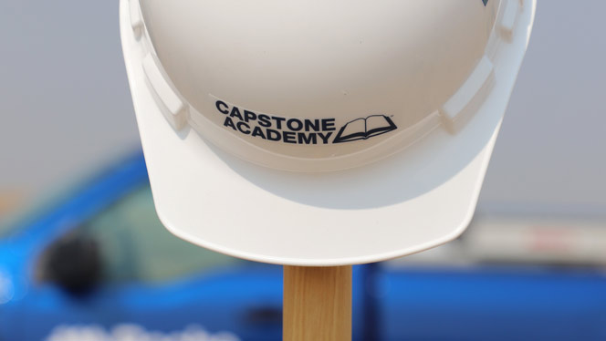 New K-6 School in Commerce City CO: Capstone Academy hard hat.