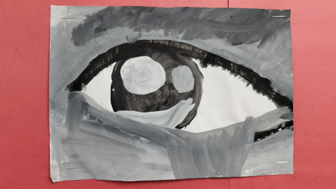 K-8 School in Colorado Springs: Student drawing of black and white eye.