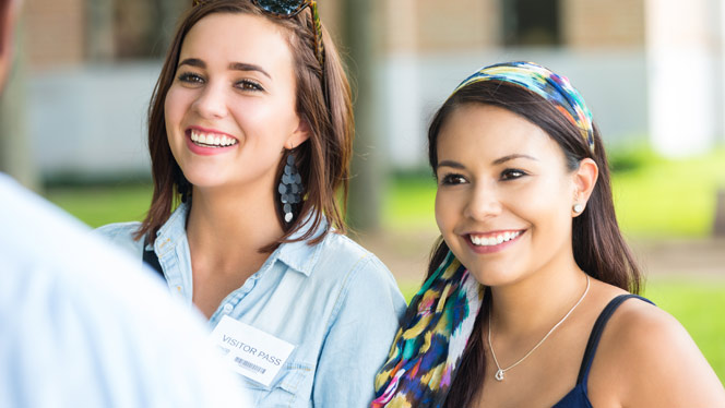 High School in Kentwood MI: Two students on college tour.