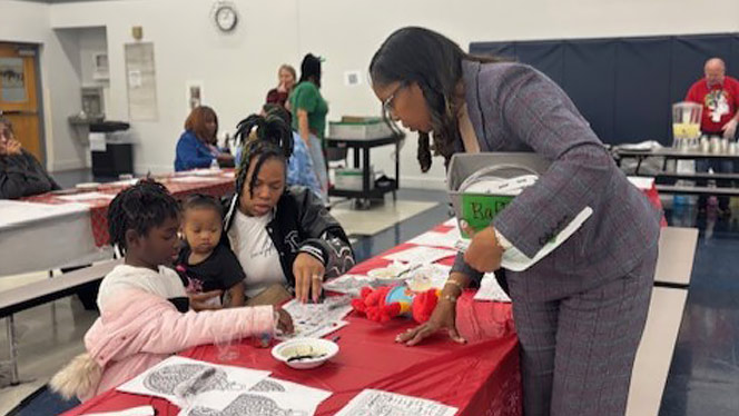 K-8 School in Toledo: Wintefield families and students participate in the school's Bingo and Mingle event.