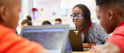 Atlanta Heights Charter School, K-8 School in Atlanta, GA: group of students sitting at laptops.