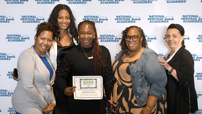 National Heritage Academies: Brooklyn Scholars leaders pose for photo after winning a Taking Flight Eagle Award.