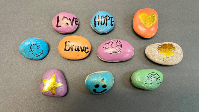 K-8 School in Matthews: Matthews Charter Academy students painted rocks as an act of Kindness Week.