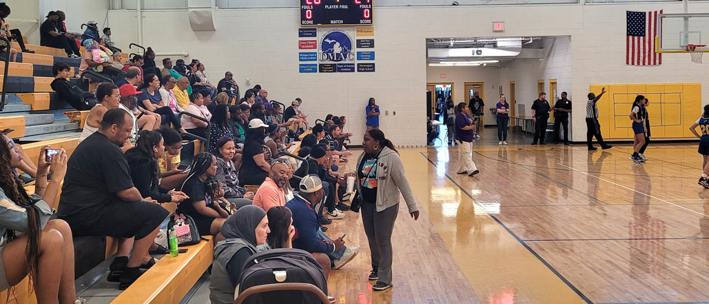 South Canton Educator Engaging NHA Scholars, Community Through Basketball