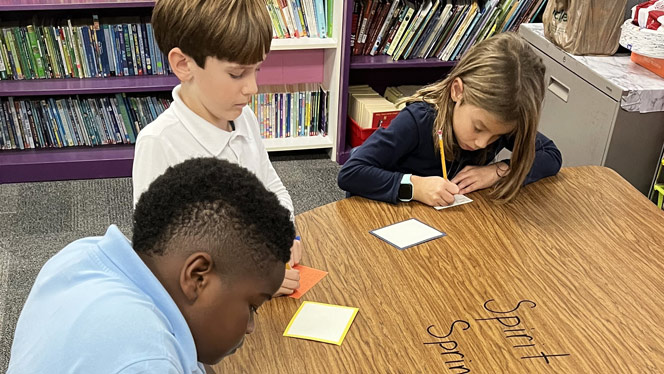 K-8 School in Mint Hill: Queen's Grant students write cards to Hurricane Helene victims.