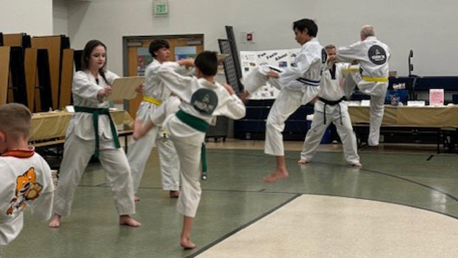 K-8 School in Commerce City: Students participate in a Taekwondo demonstration.