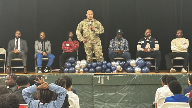 K-8 School in Brooklyn: Military member speaks to group of students at Brooklyn Scholars.